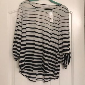 Black and white striped top.